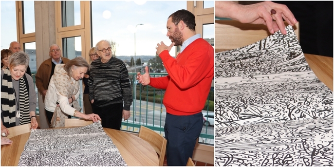 Ingo Giezendanner (r.), der an drei Standorten in der Schule seine spezielle auf den Bau gerichtete Kunst kreierte, präsentierte dem Kunstverein an der Versammlung auch sein grosses, handgebundenes Buch.