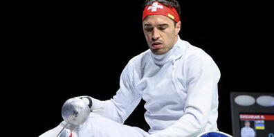 Max Heinzer - hier nach einem Sturz - führte im Achtelfinal gegen Igor Reislin mit 12:9, ehe der Ukrainer die letzten sechs Treffer landete