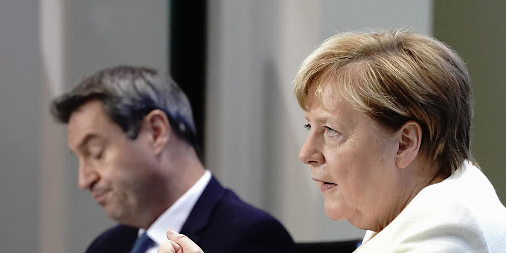 ARCHIV - Bundeskanzlerin Angela Merkel (CDU) und Markus Söder (CSU), Ministerpräsident von Bayern und CSU-Vorsitzender. Foto: Kay Nietfeld/dpa