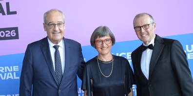 Bundesrat Guy Parmelin und Caroline Parmelin mit Lucerne-Festival-Präsident Markus Hongler.