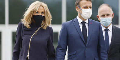 Emmanuel Macron, Präsident von Frankreich, und seine Ehefrau Brigitte Macron. Foto: Ludovic Marin/POOL AFP/AP/dpa