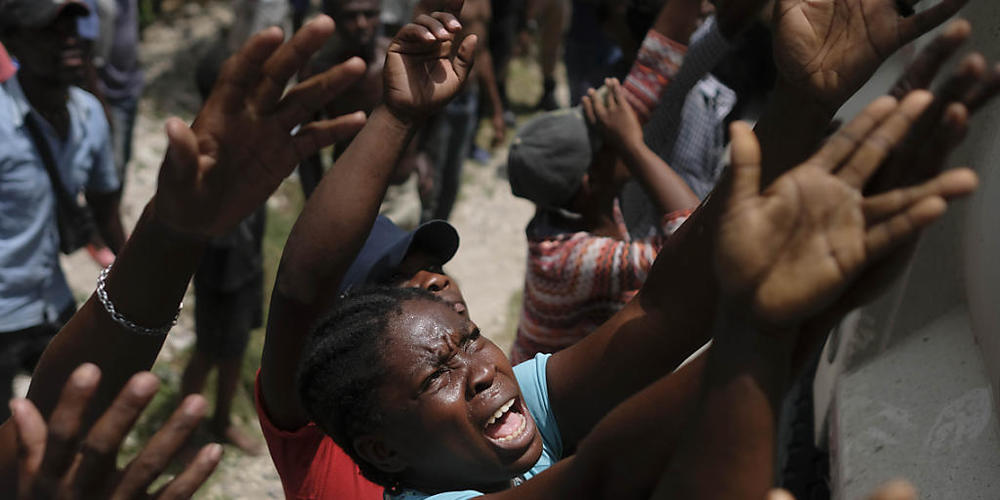 dpatopbilder - Nach dem schweren Erdbeben in Haiti ist die Zahl der Todesopfer auf 2207 gestiegen. 344 weitere Menschen werden zudem noch immer vermisst. Foto: Matias Delacroix/AP/dpa
