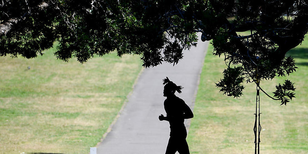 People are seen exercising outdoor at Parramatta park in Sydney, Friday, September 3, 2021. NSW LGAs of concern have had restrictions on outdoor exercise time limits eased as the current lockdown in Greater Sydney is extended until at least Septe...