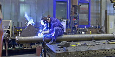 Die Schwyzer Maschinenindustrie, im Bild eine Produktionshalle von Garaventa in Goldau, und die Metallindustrie sind treibende Kräfte des Aufschwungs. 