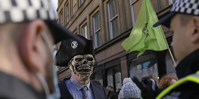 Klimaschützer kritisieren die bisherigen Ankündigungen auf der UN-Weltklimakonferenz als unzureichend. Foto: Alastair Grant/AP/dpa