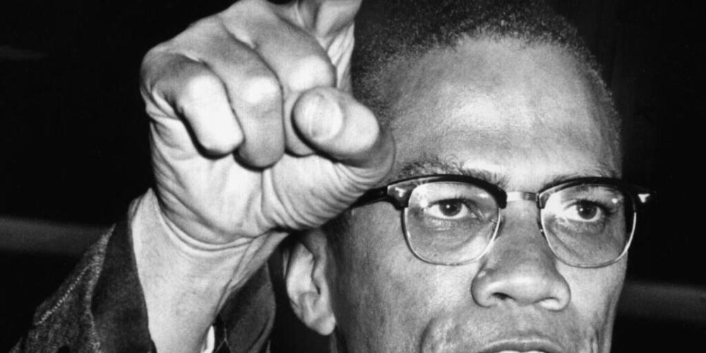 ARCHIV - Der US-amerikanische Bürgerrechtler Malcolm X spricht auf einer Kundgebung. (Archivbild) Foto: dpa