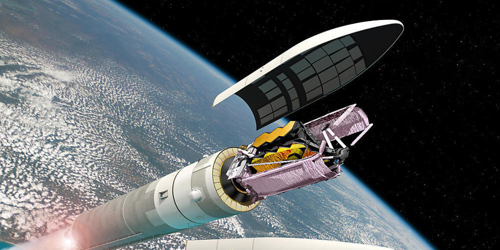 Das Weltraumteleskop liegt zu Beginn der Mission zusammengefaltet in der Ariane-5-Trägerrakete. Sein riesiger Spiegel und der Tennisplatz-grosse Sonnenschutz wird erst später entfaltet.