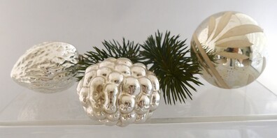 Wie wurde aus den ursprünglich verwendeten Äpfeln eigentlich der heutige Christbaumschmuck?