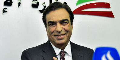 HANDOUT - George Kurdahi, Informationsminister des Libanon, spricht auf einer Pressekonferenz. Kurdahi hat seinen Rücktritt bekannt gegeben, um den diplomatischen Streit mit Saudi-Arabien zu entschärfen, den er durch seine Äußerungen über den Kamp...