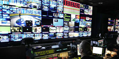 Mitarbeiter in der Nachrichtenredaktion des Senders TVN24. Foto: Czarek Sokolowski/AP/dpa