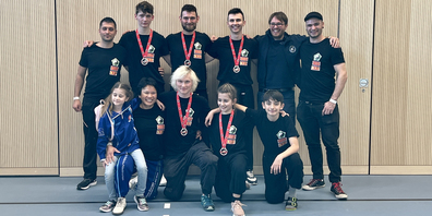(v.l.n.r kniende Reihe):  Giaia Saglione (Fan), Alexandra Schiesser (Coach), JD Jäger, Larissa Scaglione, E. Colins Solis. (v.l.n.r stehend): Luigi Scaglione (KR), Colin Bühlmann, David Leuzinger, Darko Jovic, Danny Thomas(KR) und Ralf Schmid (Coach). Kain Bucher fehlt auf dem Bild.