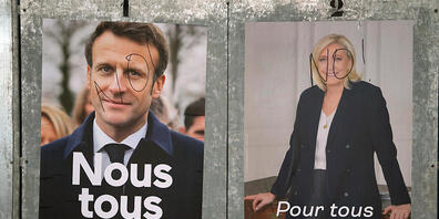Auf den Wahlkampfplakaten des französischen Präsidenten Macron (l) und der rechtsextremen Präsidentschaftskandidatin Le Pen steht der Schriftzug "No!". Foto: Bob Edme/AP/dpa