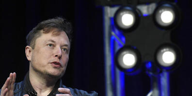 ARCHIV - Elon Musk, Vorstandsvorsitzende von Tesla und SpaceX, spricht auf der Satellite Conference and Exhibition in Washington. Foto: Susan Walsh/AP/dpa