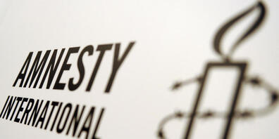 ARCHIV - Logo von Amnesty International. Foto: Britta Pedersen/dpa-Zentralbild/dpa