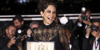 dpatopbilder - Sahra Amir Ebrahimi, Schauspielerin aus dem Iran, wird in Cannes für ihre Rolle in «Holy Spider» als beste Schauspielerin ausgezeichnet. Foto: Vianney Le Caer/Invision/AP/dpa