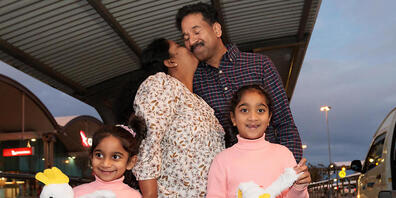 Priya and Nade Nadesalingam and their daughters Kopika and Tharnicaa, the Tamil asylum seeker family, aso known as the Murugappans and Biloela family are seen at Perth Airport in Perth, Wednesday, June 8, 2022. They are heading back to their home ...