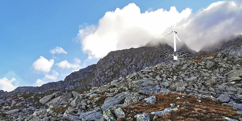 So soll die Testanlage einst aussehen: Ein Windrad mit photovoltaischen Solarblättern. Unterhalb befindet sich die Mittelstation einer ehemaligen militärischen Transportseilbahn, welche sich besonders gut eigne, um die benötigte Infrastruktur unte...