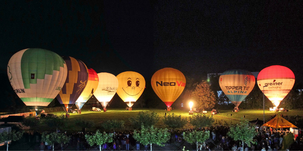 Romantisches Aufleuchten der bunten Ballonhüllen beim Night Glow.