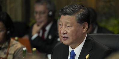 Chinas Präsident Xi Jinping spricht während des G20-Gipfels. Foto: Dita Alangkara/AP Pool/dpa