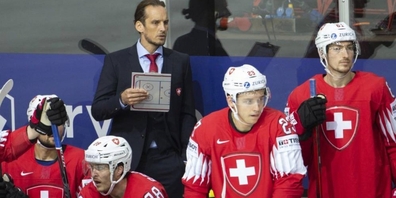 Patrick Fischer mit seinem Team