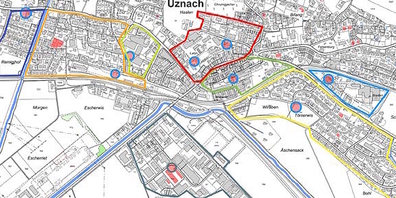 Ideenskizze der Uzner Gemeindekanzlei mit zwei Wärmeverbunden (rot, dunkelgrün) rund ums Städtchen.