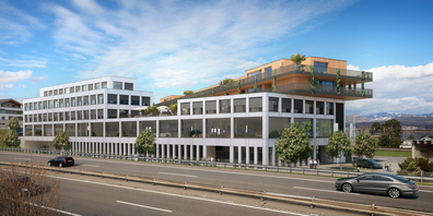 Das ist mal was anderes, wie der Blick von der Zürcherstrasse her zeigt: Die 13 Maisonette-Wohnungen in Holzbauweise in der Überbauung Lidwil in Altendorf «krönen» sozusagen die Gewerbebauten.