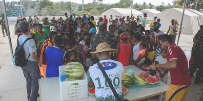 Essensausgabe in einem provisorischen Zeltlager in Brasilien für Flüchtlinge aus Venezuela. (Archivbild)