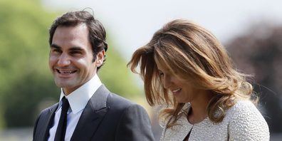 Roger und Mirka Federer spendeten der Organisation  Winterhilfe Schweiz. (Bild: AP/Kirsty Wigglesworth)