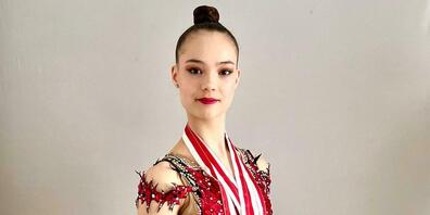 Die Goldacherin Ariana Dell: Gold mit Band, Bronze mit Keulen und im Mehrkampf