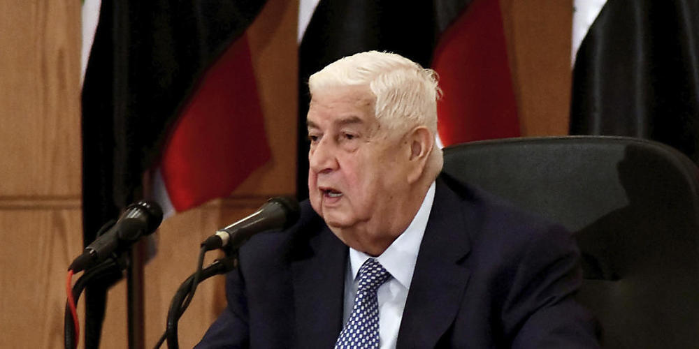HANDOUT - Walid al-Muallim, Außenminister von Syrien, spricht während einer Pressekonferenz. Syriens Regierung hat den USA vorgeworfen, die Menschen in dem Bürgerkriegsland mit neuen Sanktionen aushungern zu wollen. Foto: Uncredited/SANA/AP/dpa - ...