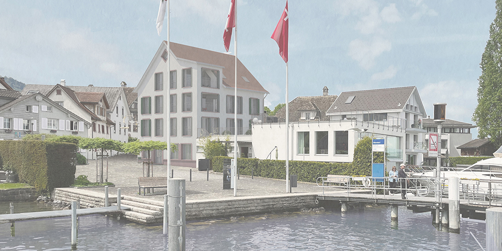 So soll sich der neue «Hecht» in der Seestatt Altendorf in gut zwei Jahren vom See aus präsentieren: Statt des «Pseudo-Riegelbaus» erhält der Neubau eine feingliedrige Silhouette, der Anbau am See bleibt als Wohnraum des Eigentümers bestehen.