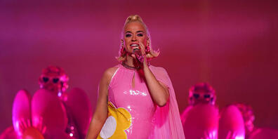 Katy Perry, performs on stage while pregnant with the Australian women's cricket team after the Women's T20 World Cup final match between Australia and India at the MCG in Melbourne, Sunday, March 8, 2020. (AAP Image/Scott Barbour) NO ARCHIVING, E...