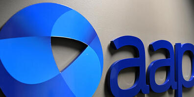 An AAP logo is seen at Sydney Bureau of national newswire Australian Associated Press in Sydney, Thursday, May 21, 2020. (AAP Image/Dean Lewins) NO ARCHIVING