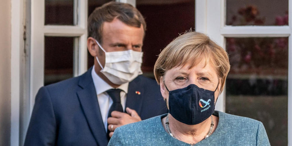 ARCHIV - Emmanuel Macron und Angela Merkel bei einem Treffen im August. Foto: Michael Kappeler/dpa