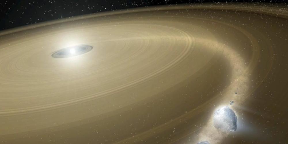 Eine künstlerische Darstellung eines Weissen Zwergs, der einen Kometen zerreisst.