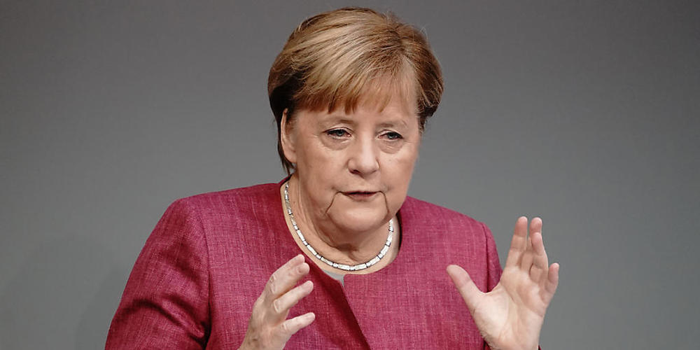 Bundeskanzlerin Angela Merkel (CDU) spricht während der Generaldebatte zum Bundeshaushalt im Bundestag. Foto: Kay Nietfeld/dpa