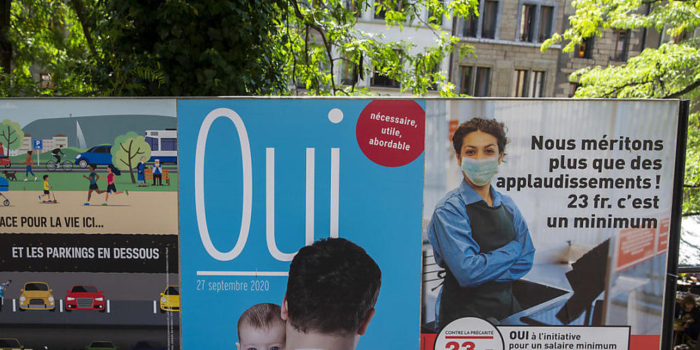 Mit dem Slogan "Wir verdienen mehr als Applaus. 23 Franken ist das Minimum" haben die Gewerkschaften und die linken Parteien in Genf für die Mindestlohn-Initiative geworben.