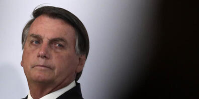 Brasiliens Präsident Jair Bolsonar nimmt an der Eröffnungszeremonie des brasilianischen Genomprojekts im Präsidentenpalast teil. Bolsonaro hat einen Verbündeten im Senat seines Amtes enthoben - laut brasilianischen Medienberichten nach dem Fund vo...
