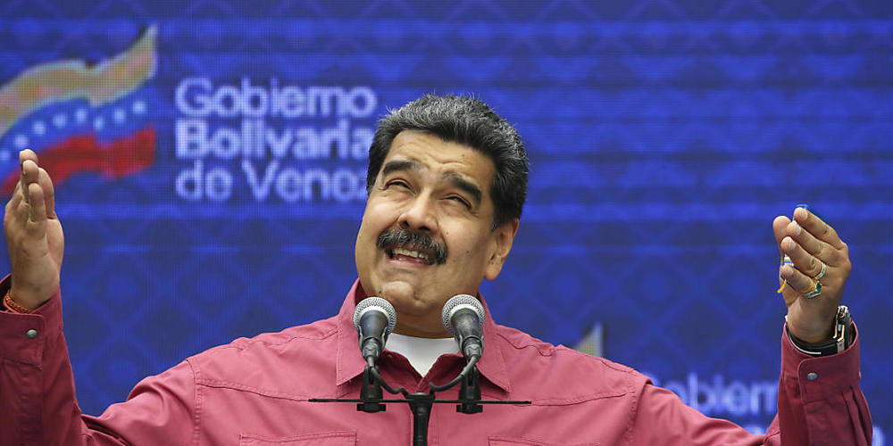 Nicolas Maduro, Präsident von Venezuela, gibt eine Pressemitteilung ab, nachdem er seine Stimme bei den Wahlen abgegeben hat. Bei der Parlamentswahl werden 277 Abgeordnete gewählt, wo die Opposition seit 2015 eine Mehrheit hatte. Foto: Ariana Cubi...