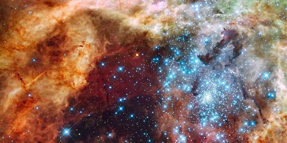 Junge Sterne in der Grossen Magellanschen Wolke: Die Geburt von Sternen wird durch die vorhandenen Gasmengen in den Galaxien bestimmt, wie eine neue Studie zeigt.