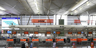 Flight departure boards showing cancelled flights at Sydney Domestic Airports Virgin and Jetstar terminal, Sydney, Tuesday, December 22, 2020. After two days of chaos as travellers tried to travel interstate before borders were closed the airport...