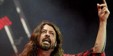 ARCHIV - Foo-Fighters-Frontmann Dave Grohl  beim Musikfestival Rock am Ring 2018. Foto: Thomas Frey/dpa