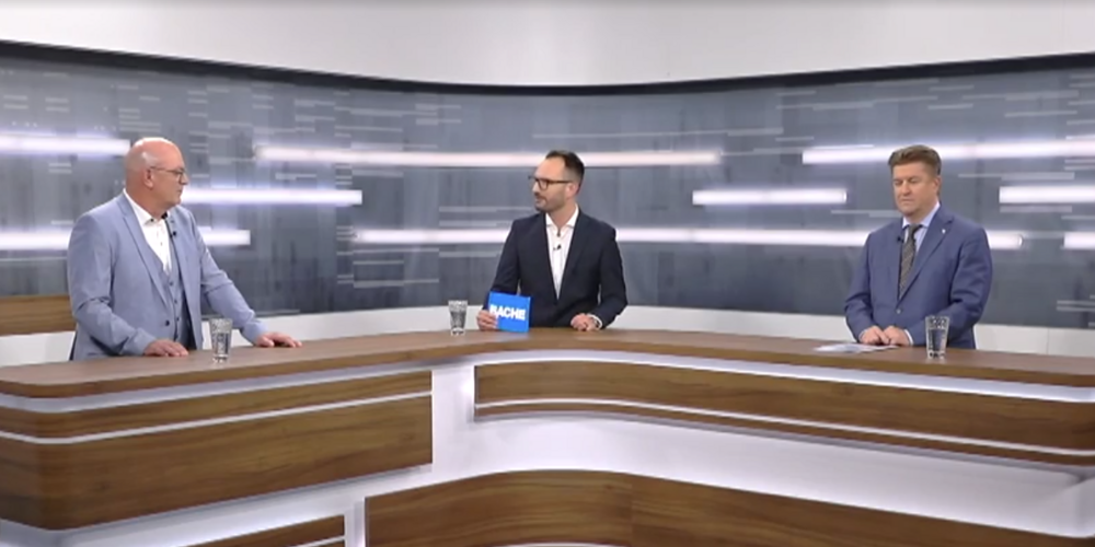 Rolf Huber (Gemeindepräsident Oberriet), Marco Latzer (Moderator), Christoph Hartmann (SVP-Regierungsrat, Vorsteher Sicherheits- und Justizdepartement)