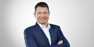 Dr.  Jörn Lützen.