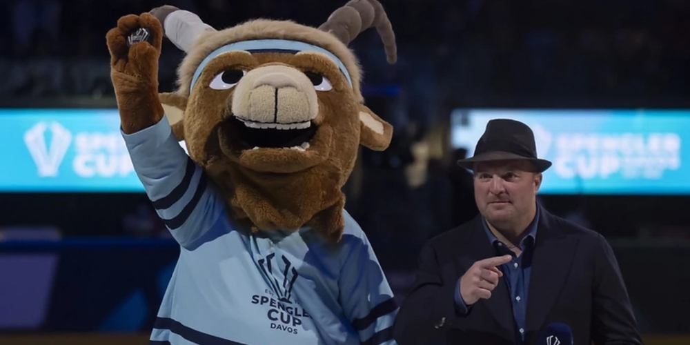 Zwei, die sich mögen: Auf der ganzen Linie zufrieden: OK-Präsident Marc Gianola mit dem Spengler-Cup-Maskottchen Hitsch (l.).