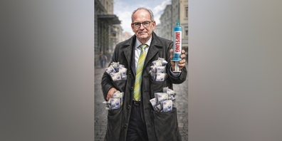 Regierungsrat B. Damann mit seinem Jahresgehalt.